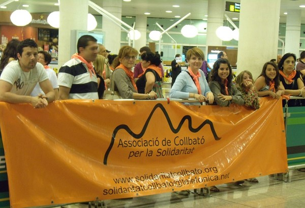 Rebuda dels infants a l'aeroport l'estiu passat